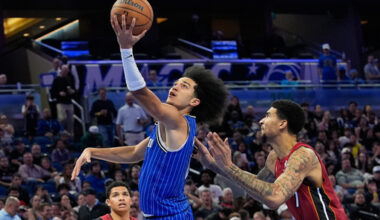 Orlando Magic guard Anthony Black shoots as he gets past Miami Heat center Kel