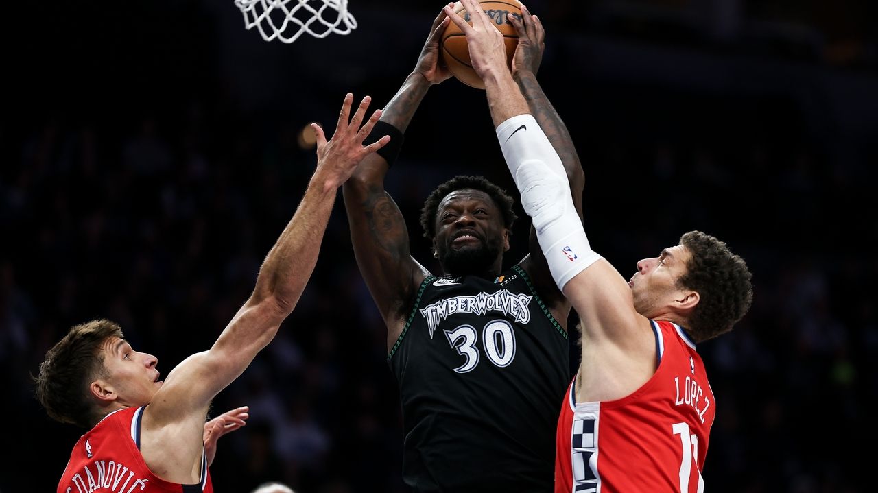 Reid makes a go-ahead 3-pointer, McDaniels scores 27 and Timberwolves edge Clippers