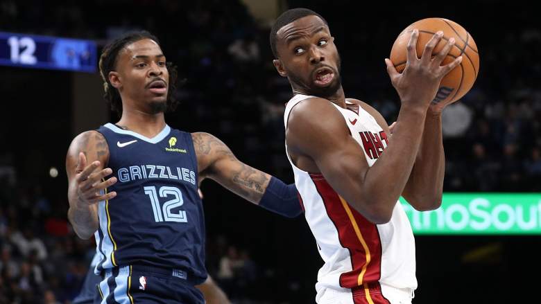 Miami Heat forward Andrew Wiggins posts up against Memphis Grizzlies guard Ja Morant