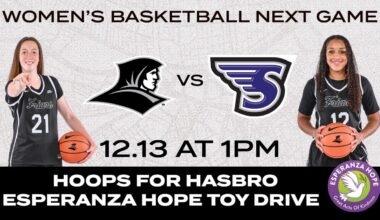 Teneisia Brown goes up for a lay-up against a Rhode Island defender.