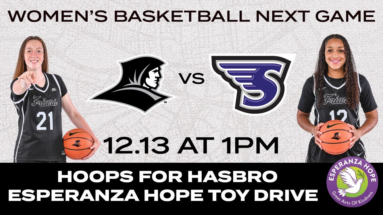 Teneisia Brown goes up for a lay-up against a Rhode Island defender.