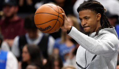 DALLAS, TEXAS - NOVEMBER 22: Ja Morant #12 of the Memphis Grizzlies looks on from the bench in the second half during timeout against the Dallas Mavericks at American Airlines Center on November 22, 2025 in Dallas, Texas. NOTE TO USER: User expressly acknowledges and agrees that, by downloading and or using this photograph, User is consenting to the terms and conditions of the Getty Images License Agreement. (Photo by Ron Jenkins/Getty Images)