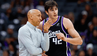 Sacramento Kings head coach Doug Christie talks with center Maxime Raynaud (42) during the fourth quarter against the Denver Nuggets at Golden 1 Center.