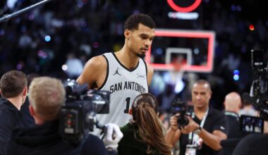 San Antonio Spurs forward Victor Wembanyama (1) stands on court before film crews after playing in an NBA Cup semifinals basketball game against the Oklahoma City Thunder, Saturday, Dec. 13, 2025, in Las Vegas. (AP Photo/Ronda Churchill)