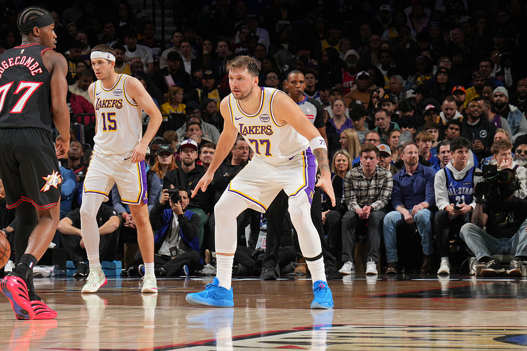 PHILADELPHIA, PA - DECEMBER 7: Luka Doncic #77 of the Los Angeles Lakers plays defense during the game against the Philadelphia 76ers on December 7, 2025 at the Wells Fargo Center in Philadelphia, Pennsylvania NOTE TO USER: User expressly acknowledges and agrees that, by downloading and/or using this Photograph, user is consenting to the terms and conditions of the Getty Images License Agreement. Mandatory Copyright Notice: Copyright 2025 NBAE (Photo by Jesse D. Garrabrant /NBAE via Getty Images)