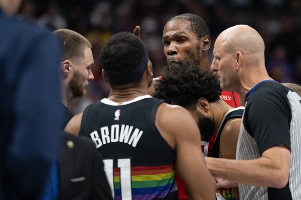 Denver Nuggets guard/forward Bruce Brown (11) and Houston Rockets forward Kevin Durant (7) get chippy during the second half on Saturday, Dec. 20, 2025, at Ball Arena in Denver. (Photo by Timothy Hurst/The Denver Post)