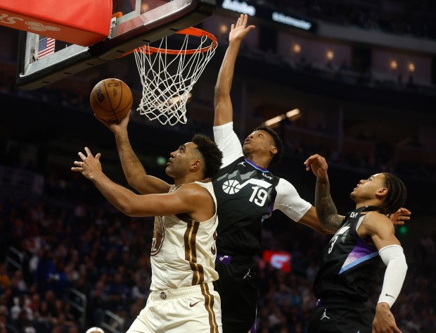 Golden State Warriors' Trayce Jackson-Davis (32) takes a shot against Utah Jazz's Ace Bailey (19) in the second quarter at the Chase Center in San Francisco, Calif., on Monday, Nov. 24, 2025. (Nhat V. Meyer/Bay Area News Group)