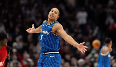 Orlando Magic guard Desmond Bane reacts to the made shot against the Portland Trail Blazers during the second half of an NBA basketball game Tuesday Dec. 23, 2025, in Portland, Ore. (AP Photo/Howard Lao)