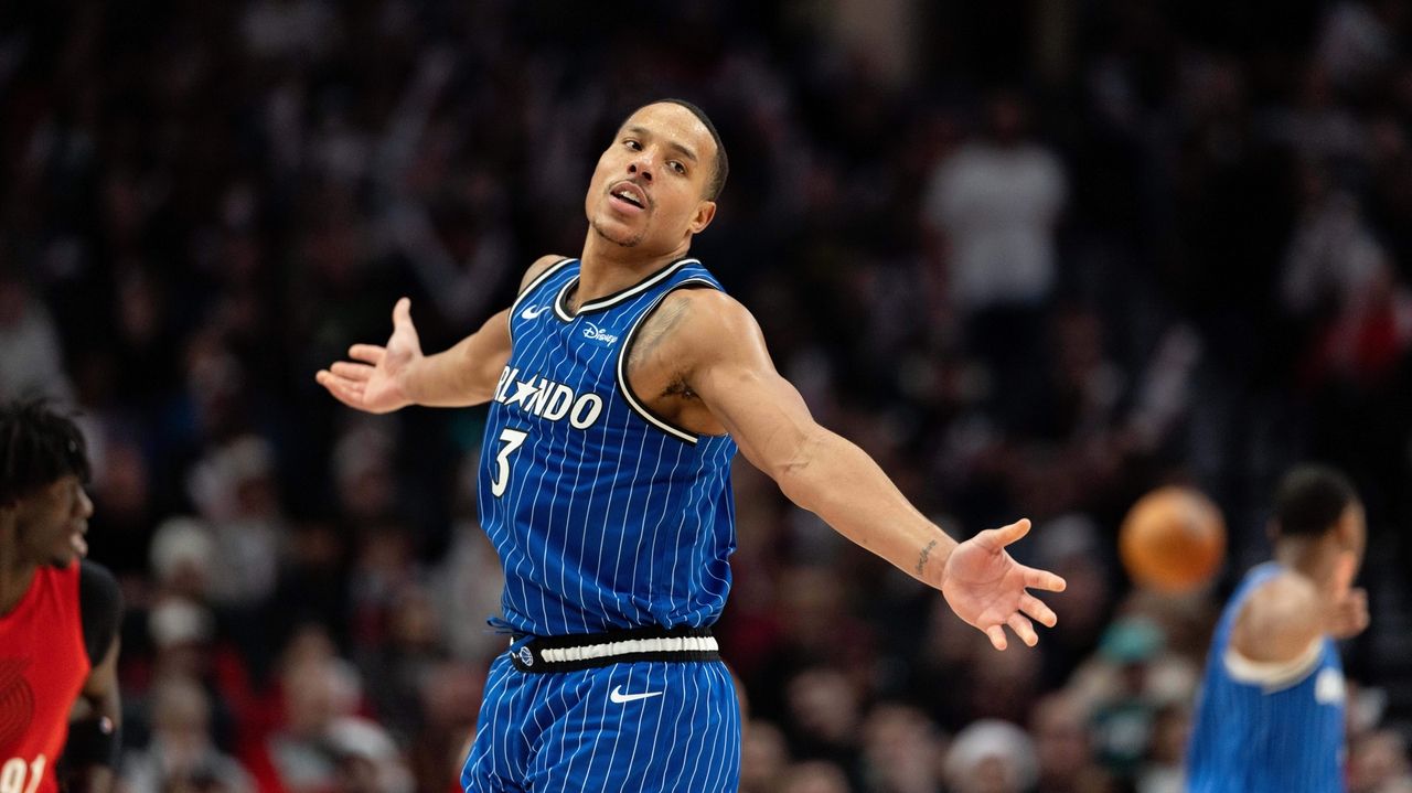 Bane's work on both ends helps Magic hold off Trail Blazers, 110-106