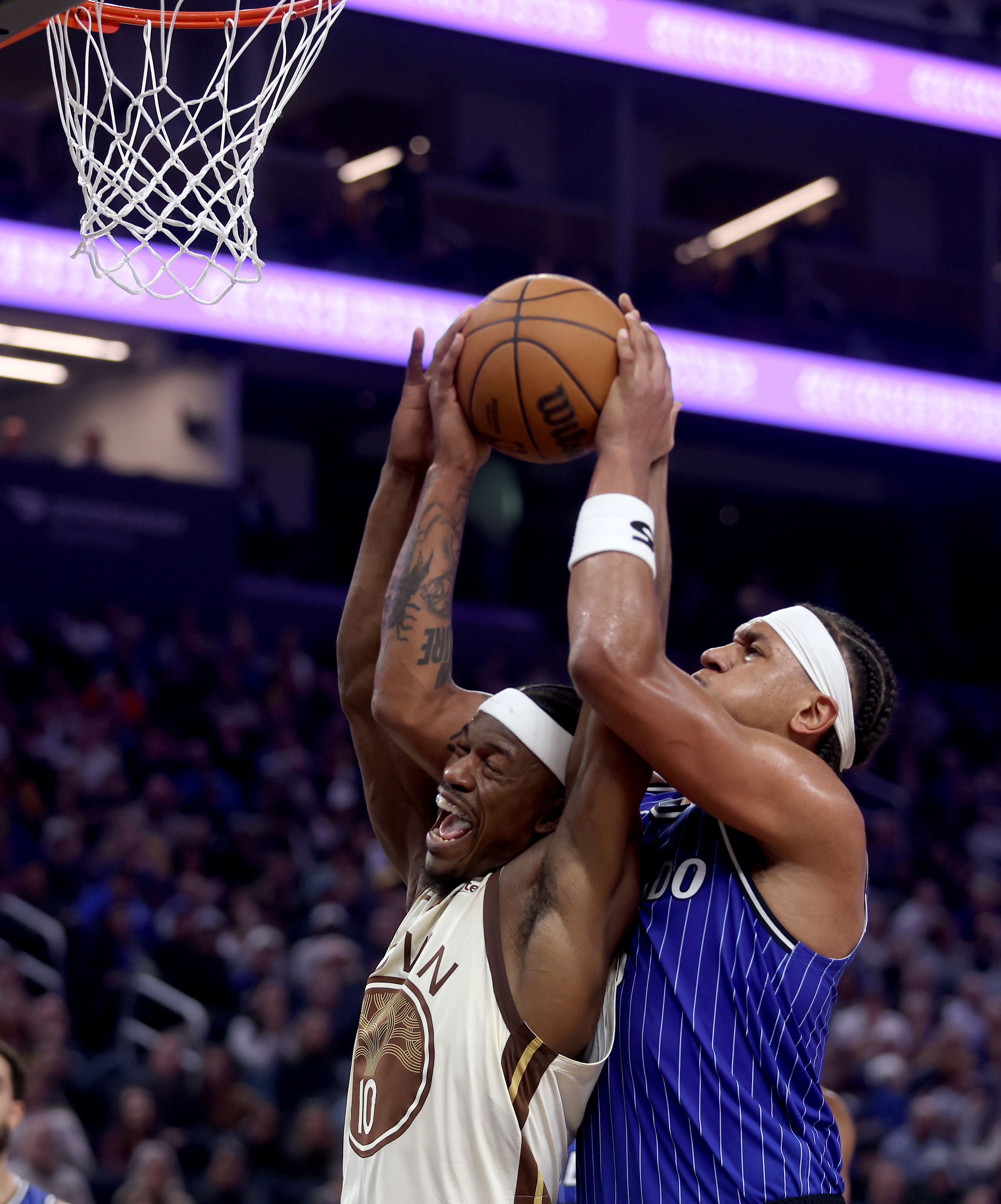 Golden State Warriors' Jimmy Butler III #10 and Orlando Magic's...