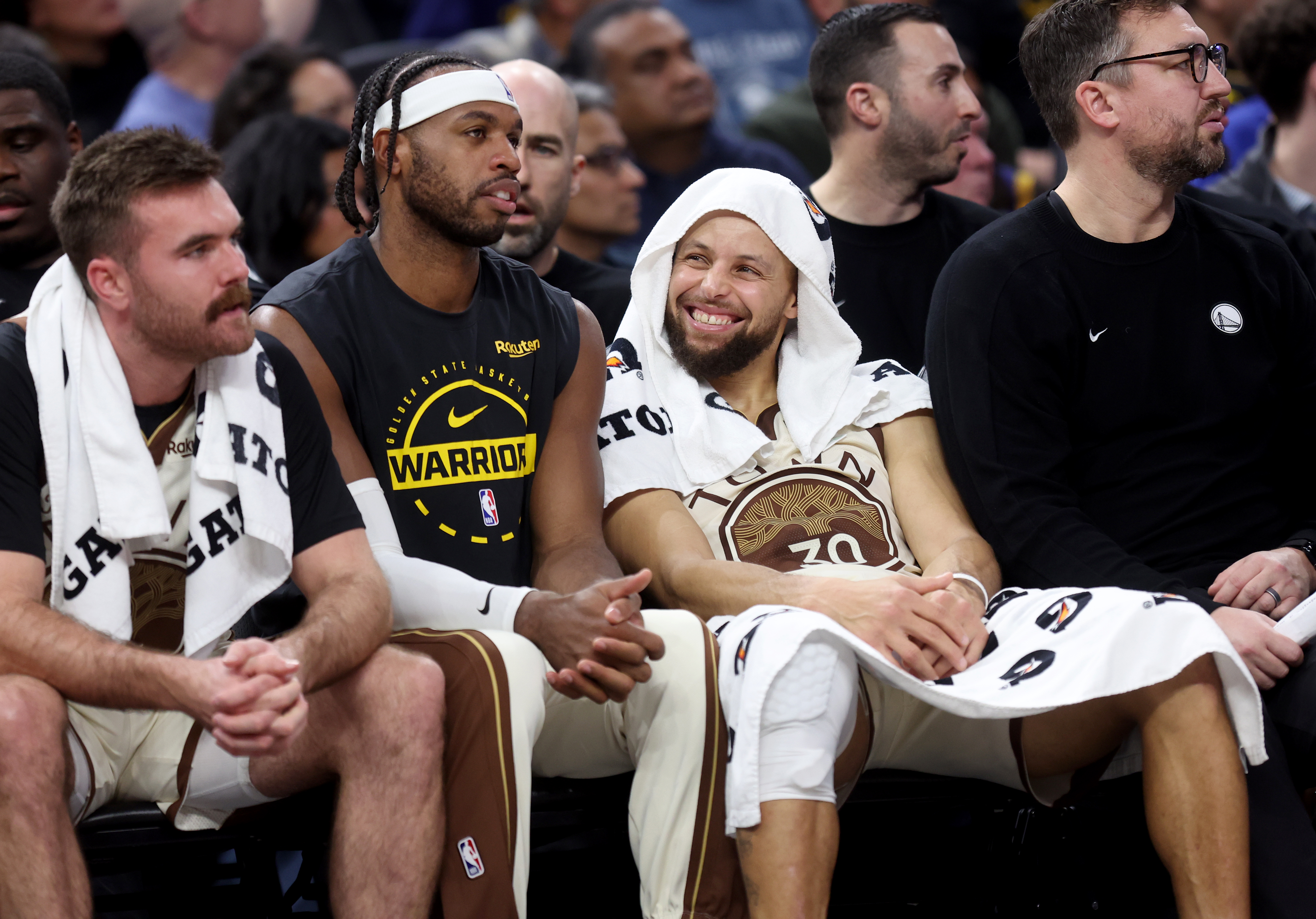 Golden State Warriors' Stephen Curry #30 on the bench in...
