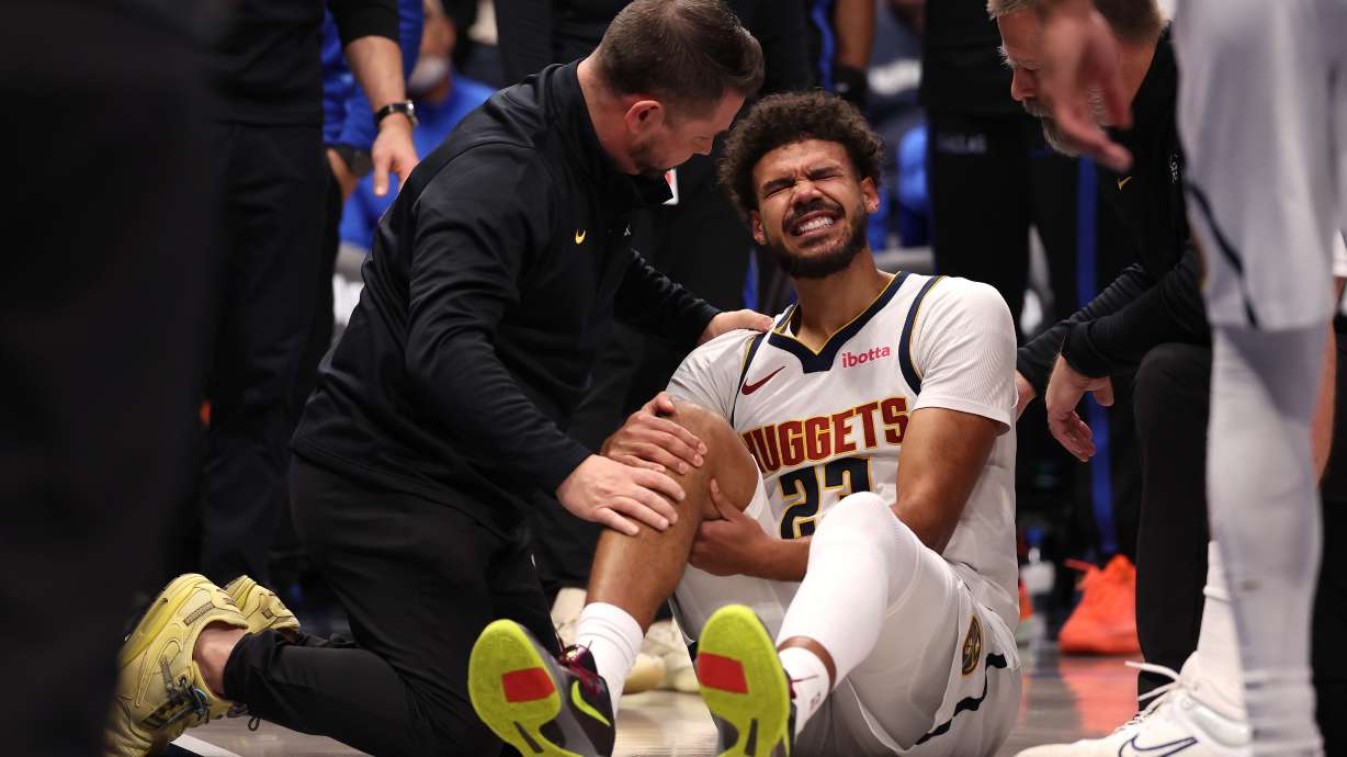 Nuggets forward Cameron Johnson avoids major knee injury but will miss a few games, AP source says