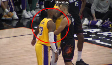 Dillon Brooks high-fiving LeBron James