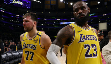 Apr 22, 2025; Los Angeles, California, USA; Los Angeles Lakers guard Luka Doncic (77) and Los Angeles Lakers forward LeBron James (23) leave a court after defeating the Minnesota Timberwolves 94-85 in game two of first round for the 2024 NBA Playoffs at Crypto.com Arena. Mandatory Credit: Kiyoshi Mio-Imagn Images