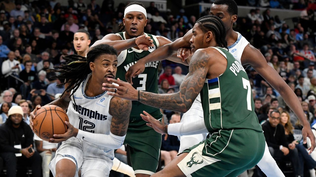 Jackson scores 24 points and Morant adds 17 in his return as the Grizzlies beat the Bucks 125-104