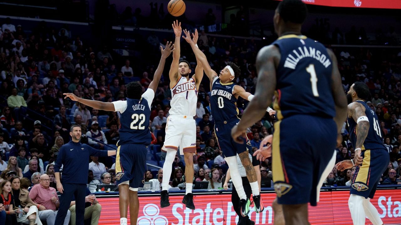Booker leads Suns past Pelicans 123-114 after Alvarado and Williams exchange punches in testy game