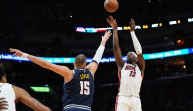 Jokic gets hurt late in 1st half, Heat pull away from there to top Nuggets