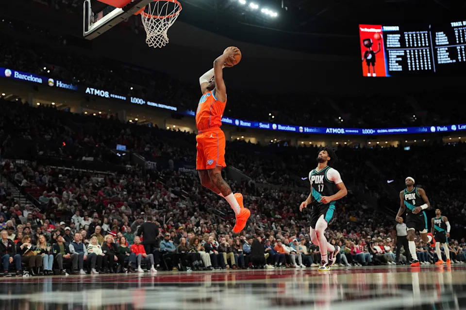 PORTLAND, OREGON - NOVEMBER 30: Jalen Williams #8 of the Oklahoma City Thunder goes up for a dunk during the second half against the Portland Trail Blazers at Moda Center on November 30, 2025 in Portland, Oregon. NOTE TO USER: User expressly acknowledges and agrees that, by downloading and or using this photograph, User is consenting to the terms and conditions of the Getty Images License Agreement. (Photo by Soobum Im/Getty Images)