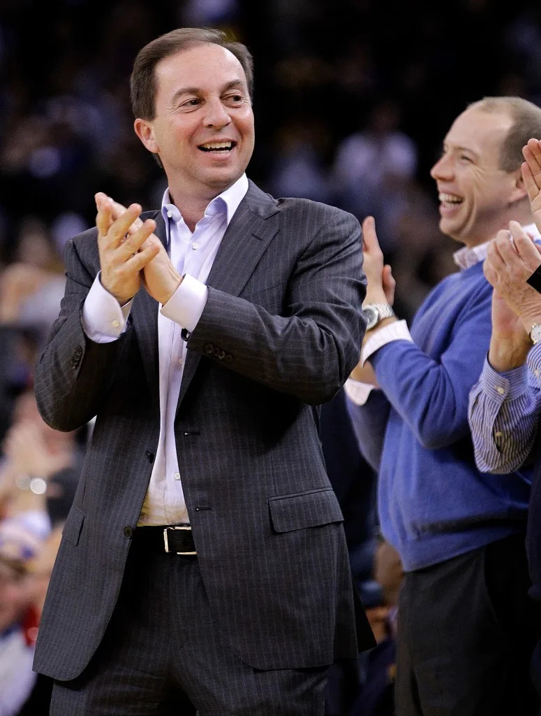 Golden State Warriors majority owner Joe Lacob applauds his team during the second half of an NBA basketball game against the Phoenix Suns Monday, Feb. 13, 2012, in Oakland, Calif. AP