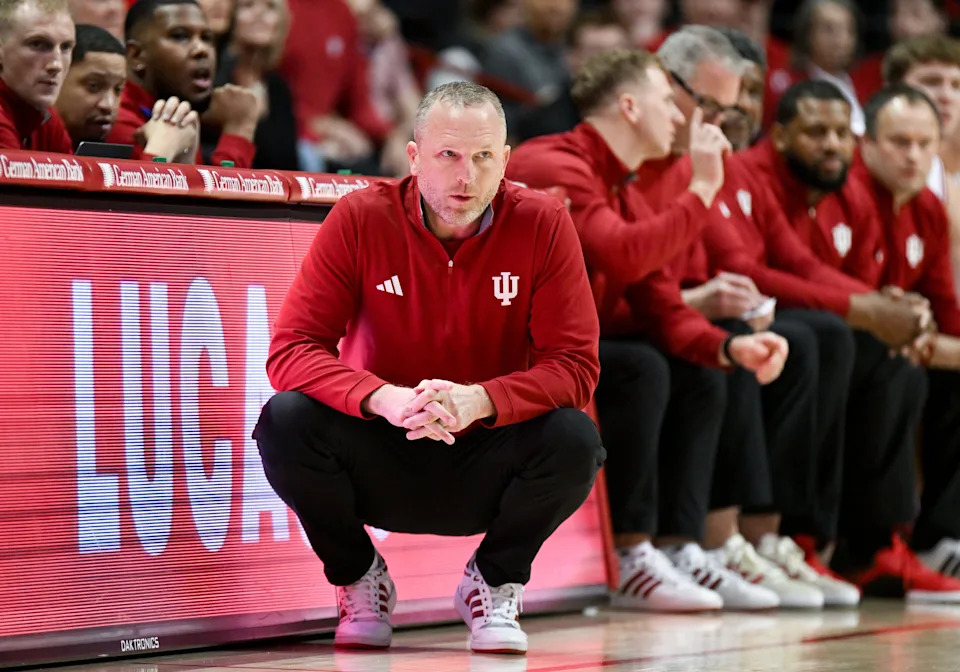 Dec 22, 2025; Bloomington, Indiana, USA; Indiana Hoosiers head coach Darian Devries looks on during the first half against the Siena Saints at Simon Skjodt Assembly Hall. Mandatory Credit: Robert Goddin-Imagn Images