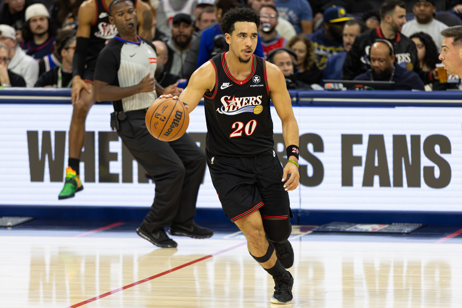 Philadelphia 76ers guard Jared McCain dribbles upcourt as the Sixers host the Indiana Pacers.