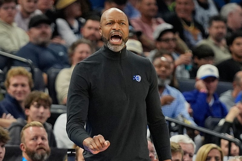 Orlando Magic head coach Jamahl Mosley shouts to players during the first half of an NBA basketball game against the San Antonio Spurs, Wednesday, Dec. 3, 2025, in Orlando, Fla. (AP Photo/John Raoux)