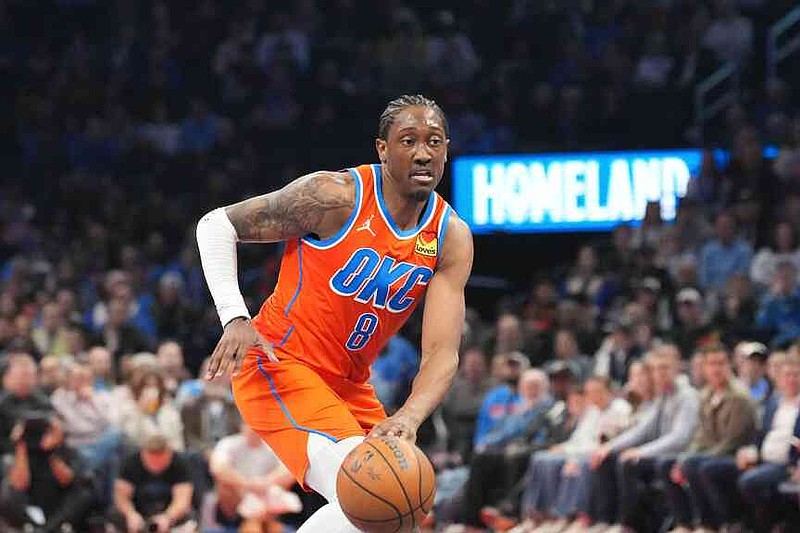 Oklahoma City Thunder guard Jalen Williams pushes down the court during the second half of an NBA Cup basketball game against the Phoenix Suns, Wednesday, Dec. 10, 2025, in Oklahoma City. (AP Photo/Kyle Phillips)