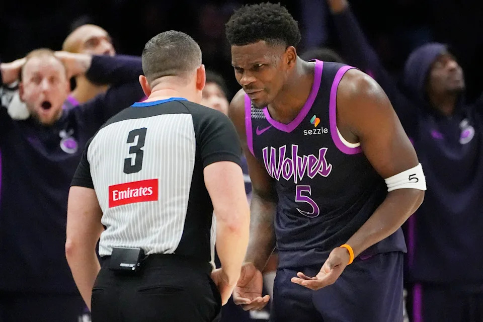 Dec 19, 2025; Minneapolis, Minnesota, USA; Minnesota Timberwolves guard Anthony Edwards (5) questions referee Nick Buchert about a call for the Oklahoma City Thunder in the fourth quarter at Target Center. Mandatory Credit: Bruce Kluckhohn-Imagn Images