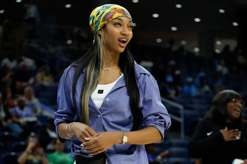 Aug 5, 2025; Chicago, Illinois, USA; Injured Chicago Sky forward Angel Reese (5) stands on the court before a WNBA game against the Washington Mystics at Wintrust Arena. Mandatory Credit: Kamil Krzaczynski-Imagn Images© Kamil Krzaczynski-Imagn Images