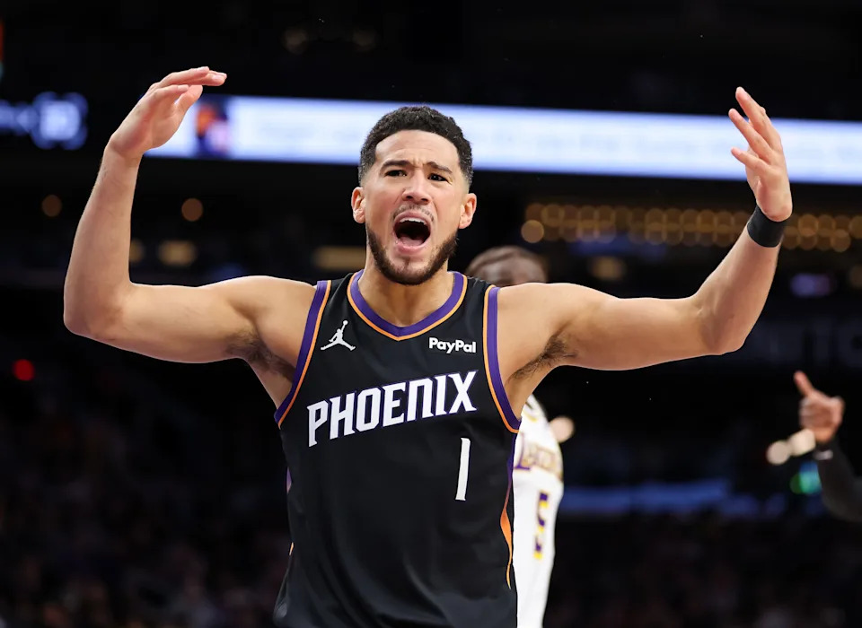Devin Booker #1 of the Phoenix Suns reacts to a call during the second half of a game against the Los Angeles Lakers at Mortgage Matchup Center on Dec. 14, 2025, in Phoenix.