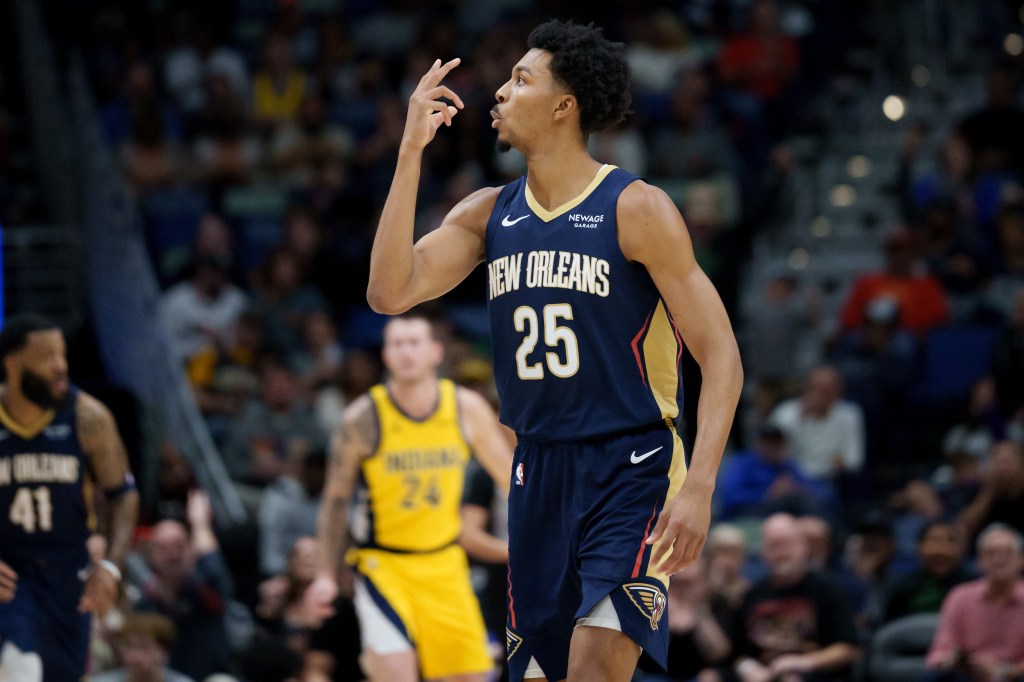 New Orleans Pelicans forward Trey Murphy III reacting after making a basket.