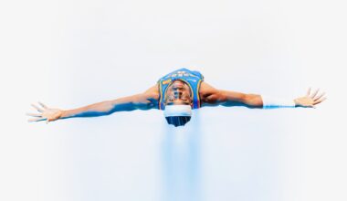 Shai Gilgeous-Alexander posing with his arms outstretched.