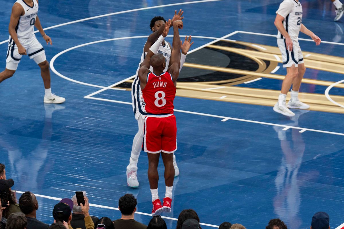 Los Angeles Clippers guard Kris Dunn (8) makes a corner three during an NBA basketball game against the Memphis Grizzlies, Friday November 28th, 2025 in Los Angeles, California.