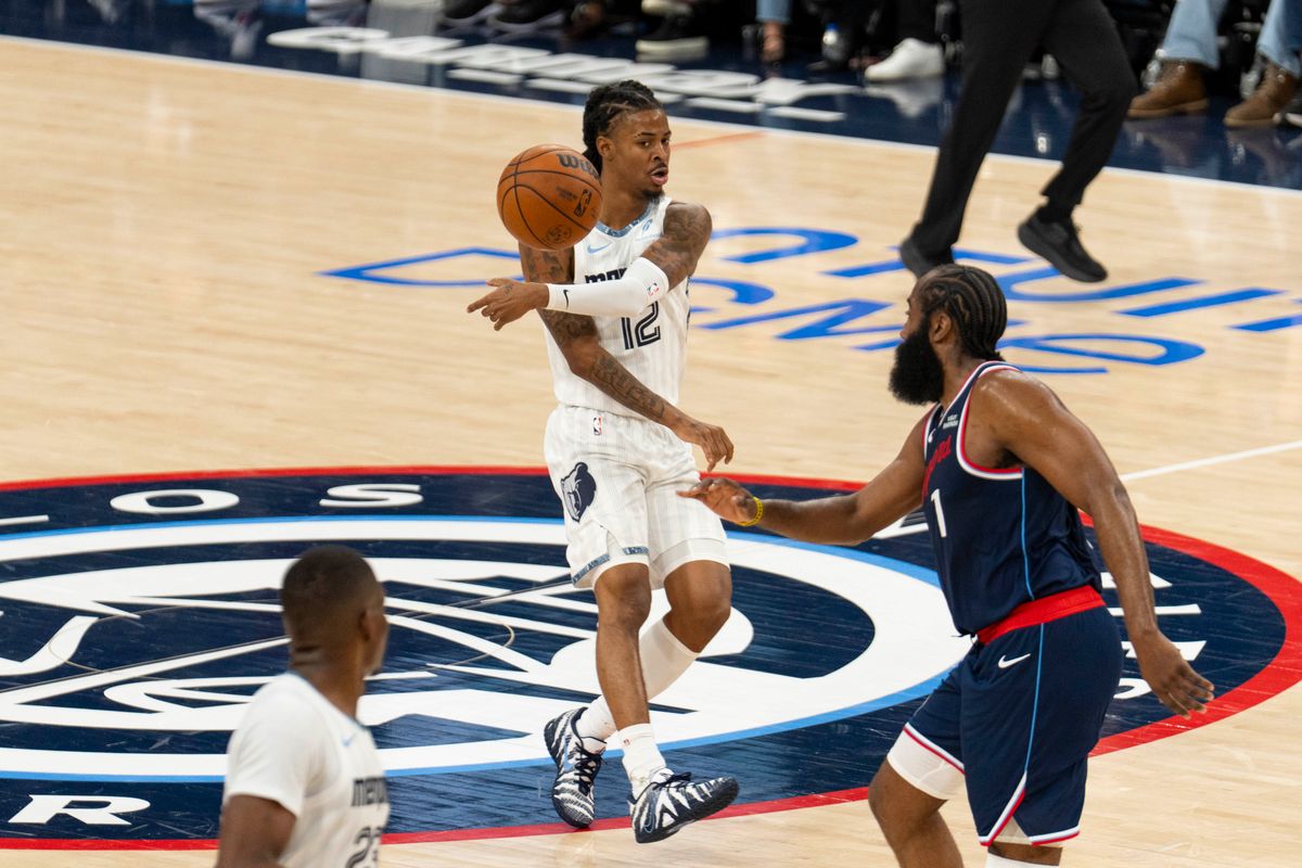 Memphis Grizzlies guard Ja Morant (12) delivers a no-look pass during an NBA basketball game against the Los Angeles Clippers, Monday December 15th, 2025 in Los Angeles, California. Memphis Grizzlies guard Ja Morant (12) delivers a no-look pass during an NBA basketball game against the Los Angeles Clippers, Monday December 15th, 2025 in Los Angeles, California.