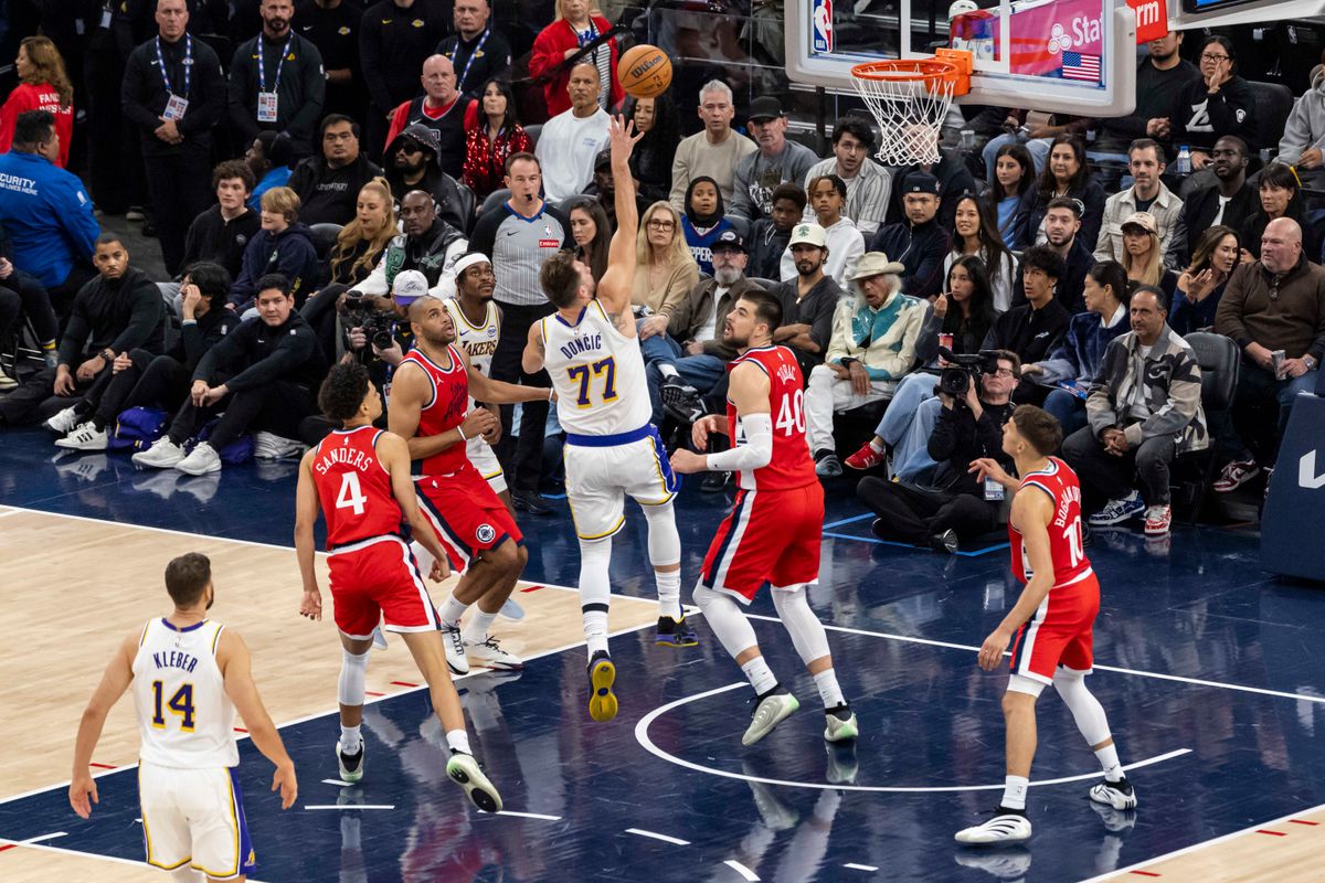 Luka Doncic #77 of the Los Angeles Lakers shoots the ball during an NBA basketball game against the LA Clippers, Saturday December 20, 2025 in Inglewood, Calif.