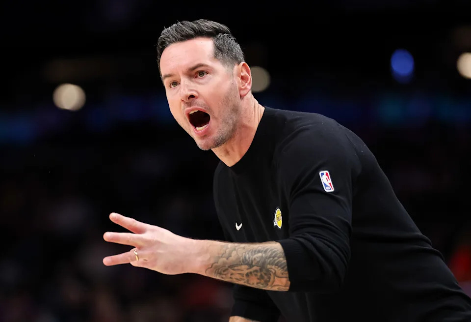 PHOENIX, ARIZONA - DECEMBER 14: JJ Redick of the Los Angeles Lakers calls out to an official during the second half of a game against the Phoenix Suns at Mortgage Matchup Center on December 14, 2025 in Phoenix, Arizona. NOTE TO USER: User expressly acknowledges and agrees that, by downloading and or using this photograph, User is consenting to the terms and conditions of the Getty Images License Agreement. (Photo by Mike Christy/Getty Images)