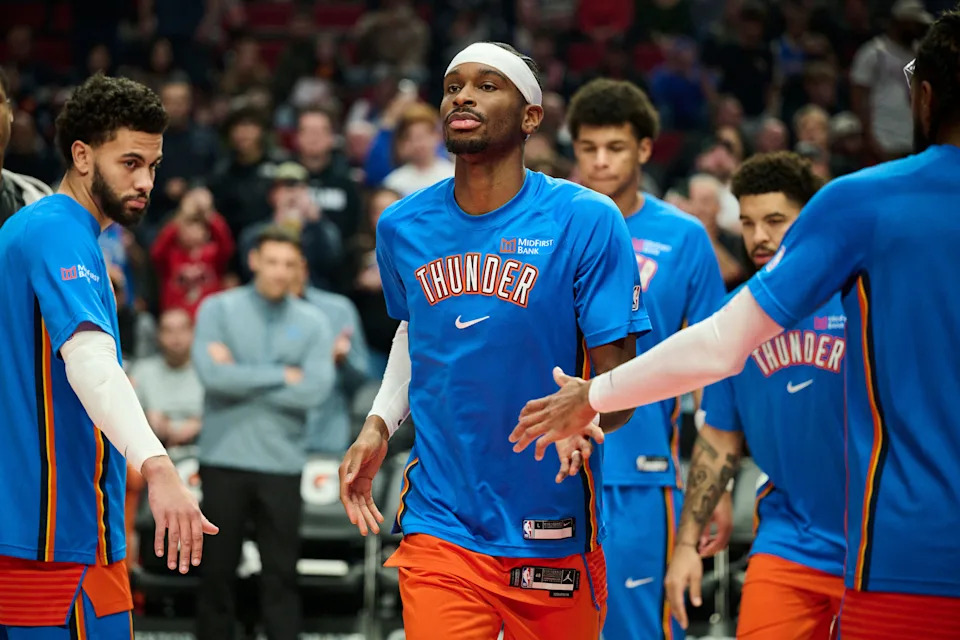 Nov 30, 2025; Portland, Oregon, USA; Oklahoma City Thunder guard Shai Gilgeous-Alexander (2) greets teammates during introductions before a game against the Portland Trail Blazers at Moda Center. Mandatory Credit: Troy Wayrynen-Imagn Images