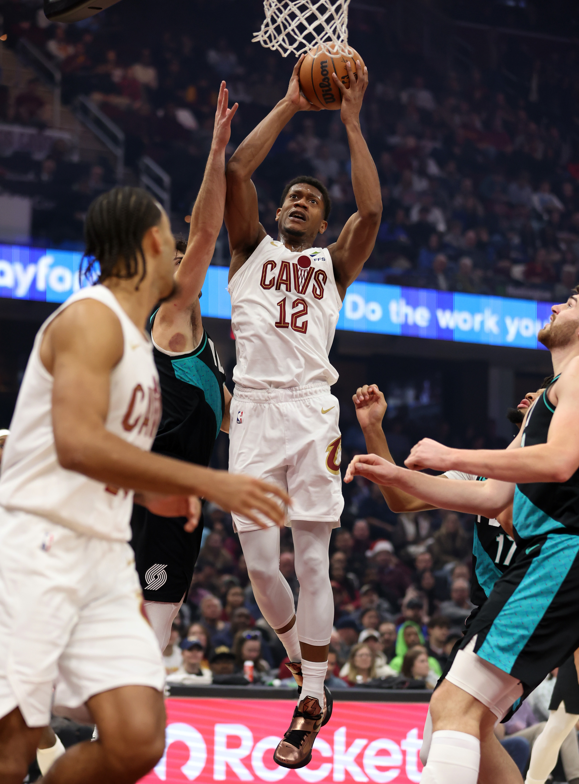 Cleveland Cavaliers forward De'Andre Hunter puts up a shot against the Portland Trail Blazers in the first half of play. 