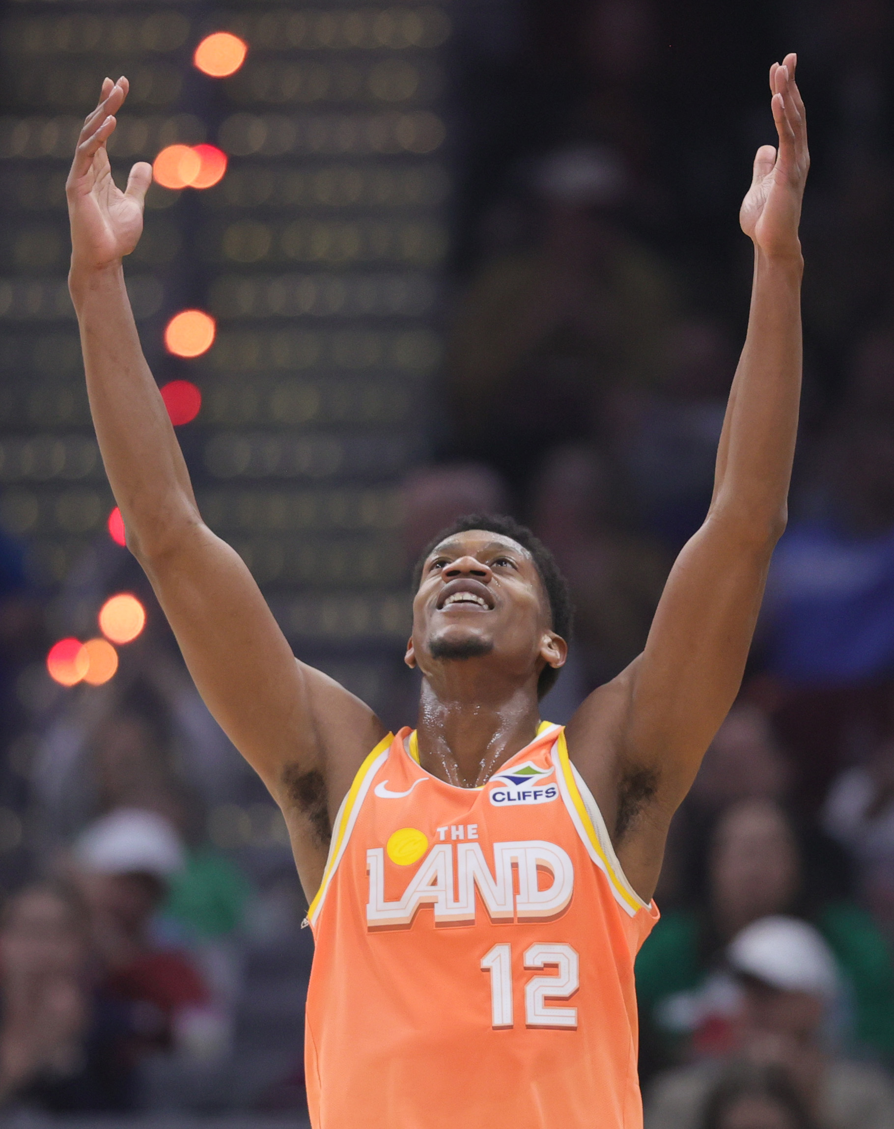 Cleveland Cavaliers forward De'Andre Hunter celebrates his three-point score in the first half at Rocket Arena. 