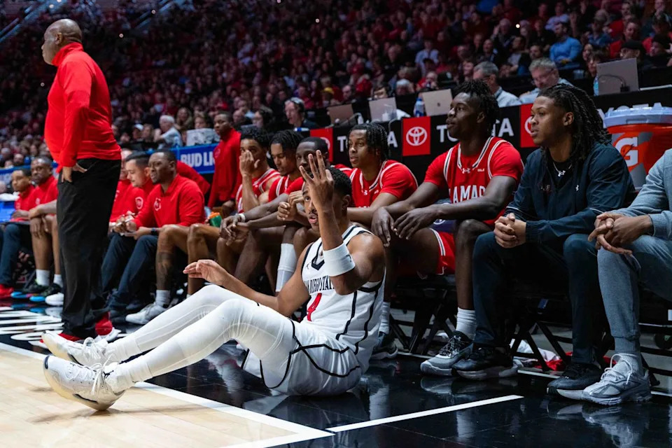 San Diego State guard Sean Newman Jr. (4) reacts to being fouled on a three pointer during an NCAA Basketball game between Lamar and San Diego State, Wednesday December 10, 2025 at Viejas Arena in San Diego, Calif.