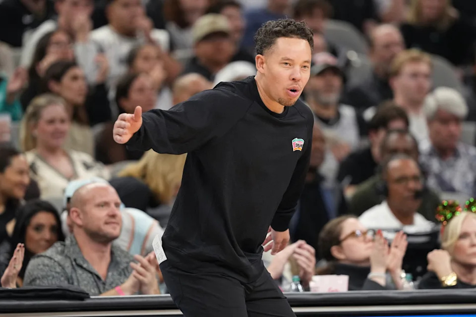 Dec 23, 2025; San Antonio, Texas, USA; San Antonio Spurs Head Coach Mitch Johnson signals to players during the second half against the Oklahoma City Thunder at Frost Bank Center. Mandatory Credit: Scott Wachter-Imagn Images