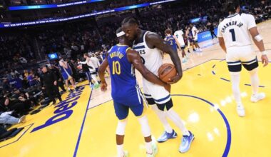 SAN FRANCISCO, CA - DECEMBER 12: Jimmy Butler #10 of the Golden State Warriors & Julius Randle #30 of the Minnesota Timberwolves hug after the game on December 12, 2025 at Chase Center in San Francisco, California. — AFP