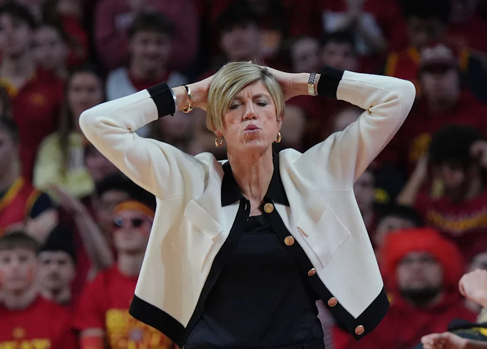 Iowa Hawkeyes women' basketball head coach Jan Jensen reacts during the second quarter against Iowa State in the NCAA women's basketball Cy-Hawk Series on Dec. 10, 2025, at Hilton Coliseum in Ames, Iowa.