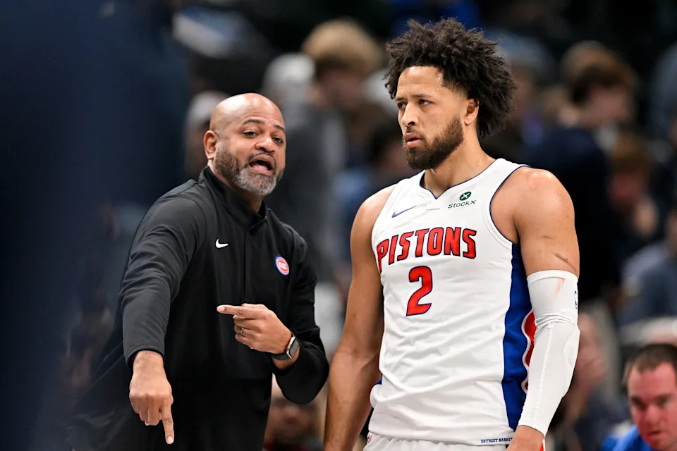 Detroit Pistons head coach J.B. Bickerstaff talks with guard Cade Cunningham (2) during the first quarter against the Dallas Mavericks at American Airlines Center in Dallas on Thursday, Dec. 18, 2025.