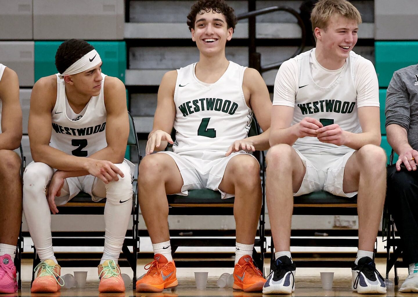 From left, Westwood captains Robert Liriano-Alejandro, Adrian Ortiz and Ty Pindel soaked in the moment as the Wolverines finished off a Tri-Valley League win over visiting Norwood Sunday.