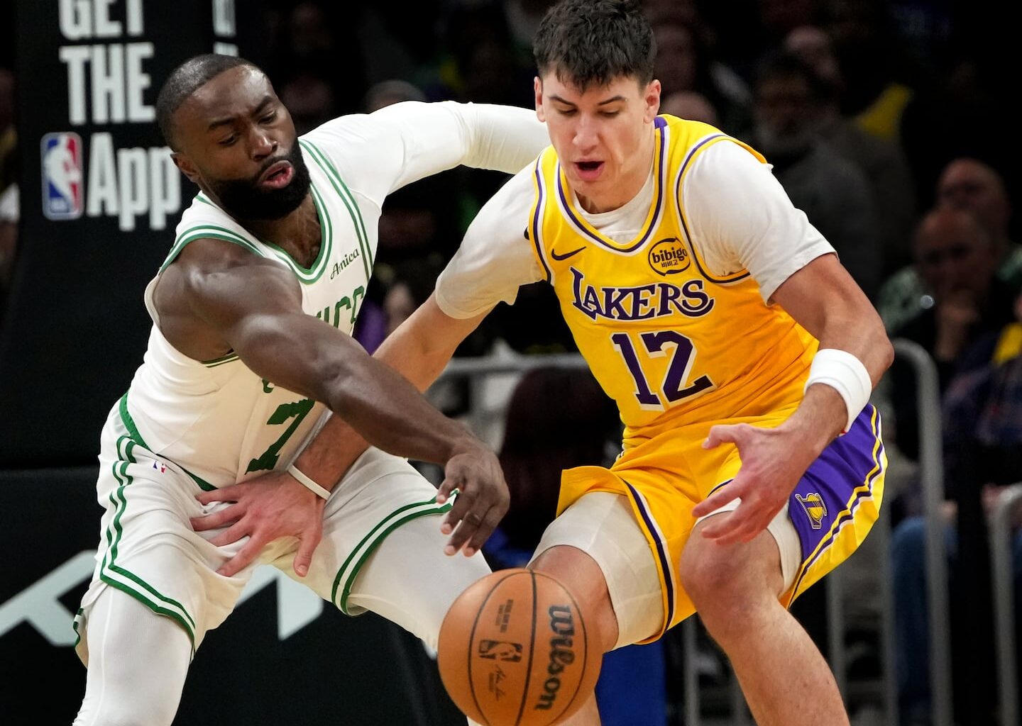 Jaylen Brown (right), stealing the ball from Lakers forward Jake Laravia in the Celtics' blowout victory Friday night, has preached patience and remained positive.