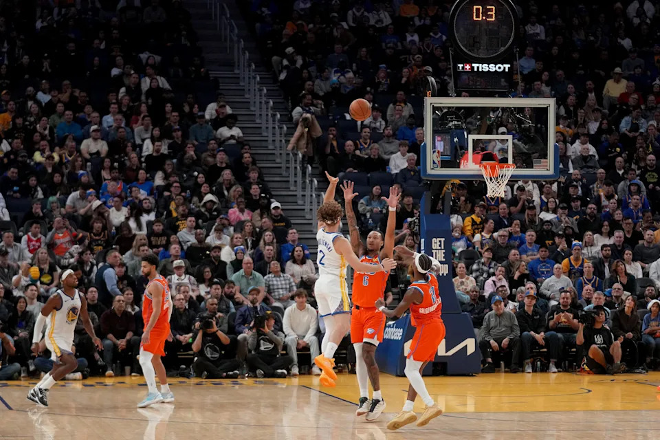 Dec 2, 2025; San Francisco, California, USA; Golden State Warriors guard Will Richard (3) makes a three point basket over Oklahoma City Thunder forward Jaylin Williams (6) at the end of the third quarter at the Chase Center. Mandatory Credit: Cary Edmondson-Imagn Images