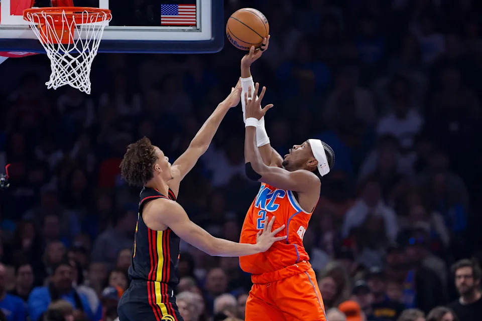 Dec 29, 2025; Oklahoma City, Oklahoma, USA; Oklahoma City Thunder guard Shai Gilgeous-Alexander (2) shoots as Atlanta Hawks guard Dyson Daniels (5) defends the shot during the first quarter at Paycom Center. Mandatory Credit: Alonzo Adams-Imagn Images