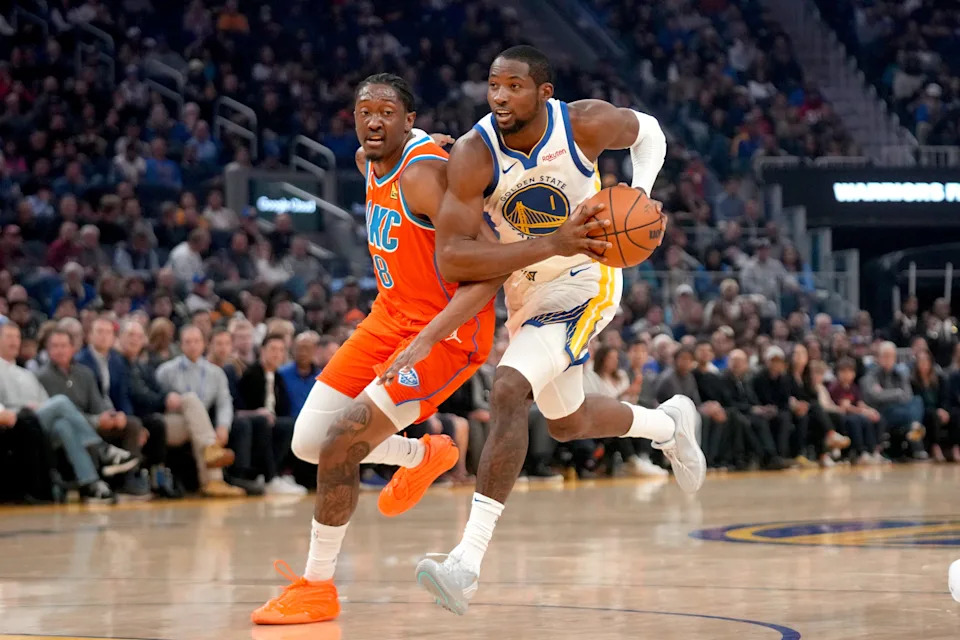 Dec 2, 2025; San Francisco, California, USA; Golden State Warriors forward Jonathan Kuminga (1) drives past Oklahoma City Thunder guard Jalen Williams (8) in the first quarter at the Chase Center. Mandatory Credit: Cary Edmondson-Imagn Images