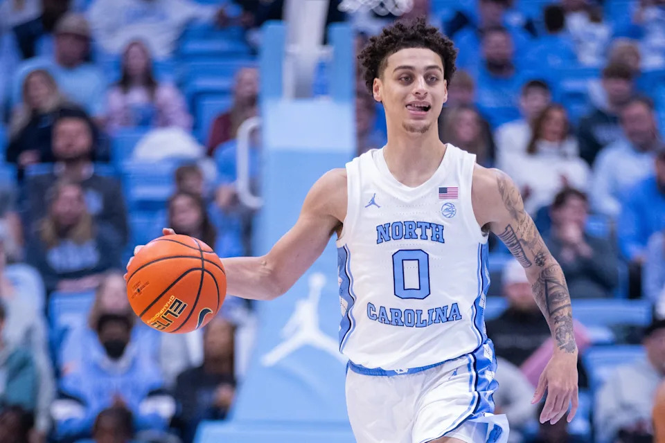 Dec 16, 2025; Chapel Hill, North Carolina, USA; North Carolina Tar Heels guard Kyan Evans (0) brings the ball up court during the second half against the ETSU Buccaneers at Dean E. Smith Center. Mandatory Credit: Scott Kinser-Imagn Images